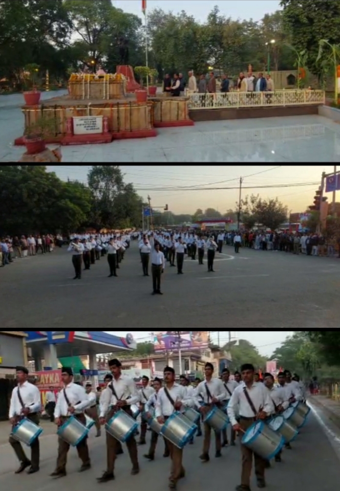 स्वयंसेवकों ने सर्वप्रथम वीरांगना रानी लक्ष्मीबाई की समाधि स्थल पर उन्हें श्रद्धा सुमन अर्पित करते हुए समाधि स्थल से लेकर जीवायएमसी मैदान तक पथ संचलन निकाला गया।